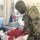Soldier surprises over 100 children